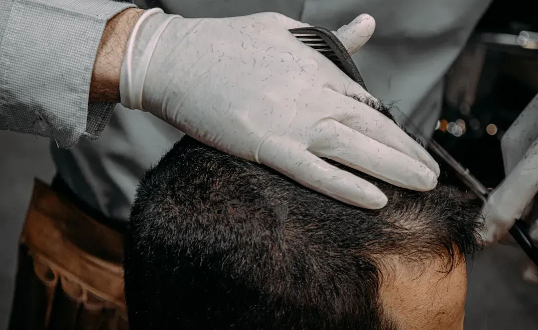 Medical professional administering peptide injection into scalp for hair growth treatment using GHK-Cu and Thymosin Beta-4