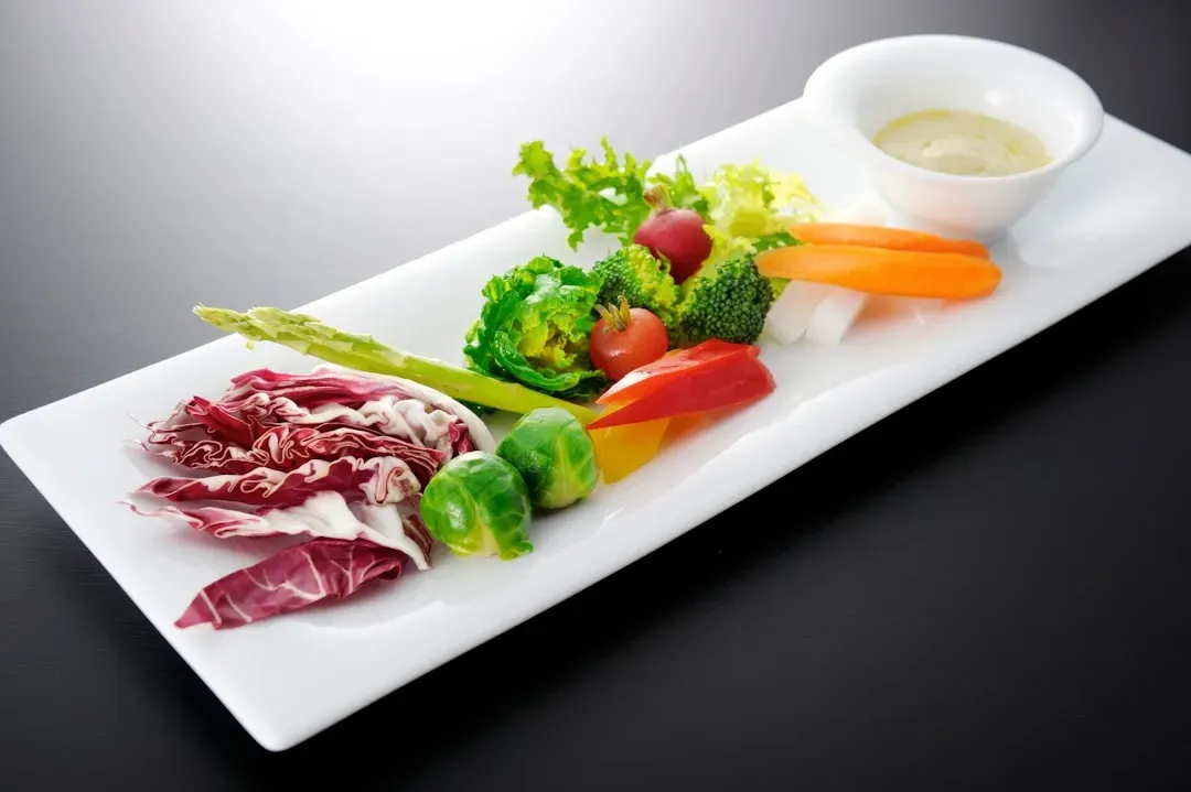 Person exercising, preparing healthy meals, and drinking water demonstrating integrated lifestyle changes for peptide injecti